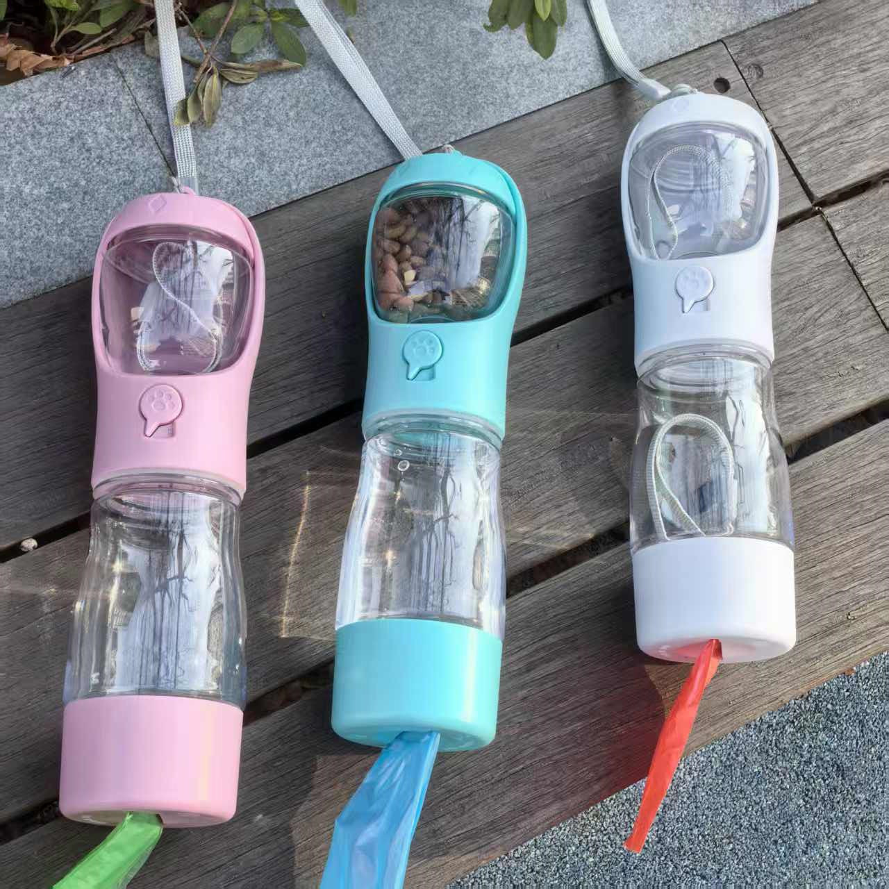 3-in-1 pet travel cup and feeder in blue, pink, and white – all colour options