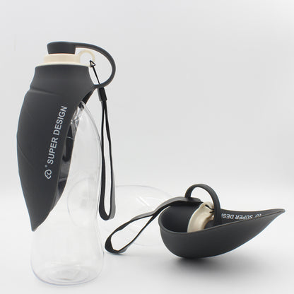 Black FlipSip 580ml pet water bottle with one-hand flip lid, ideal for walks and outdoor adventures