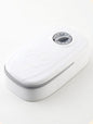 Dog eating from gravity food feeder – automatic pet food dispenser
