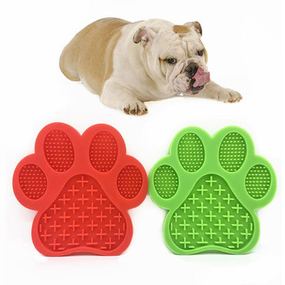 LickEase silicone lick mat in use with dog licking peanut butter during bath — calm grooming aid

