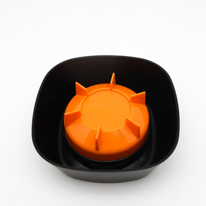 Non-slip base of slow-feeding lick bowl staying in place on hard floor