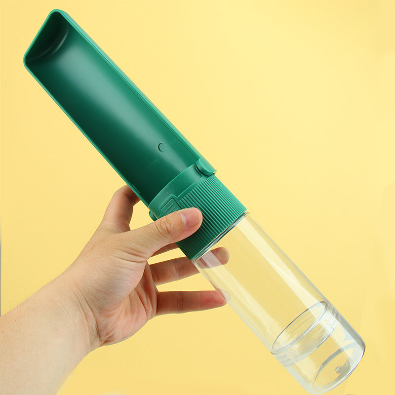 One-click water release button on SipSnack portable pet water bottle for dogs and cats outdoors