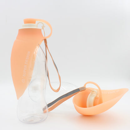 Orange FlipSip portable dog water bottle with flip cup dispenser, lightweight and easy to carry