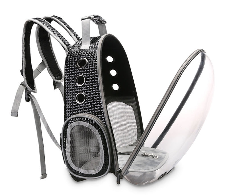 Person wearing space capsule pet backpack on city walk with cat inside