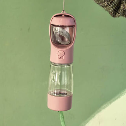 Pink 3-in-1 pet travel cup and feeder – lightweight pet walk companion