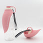 Pink FlipSip portable pet water bottle with flip cup, perfect for dog parks, travel and camping trips