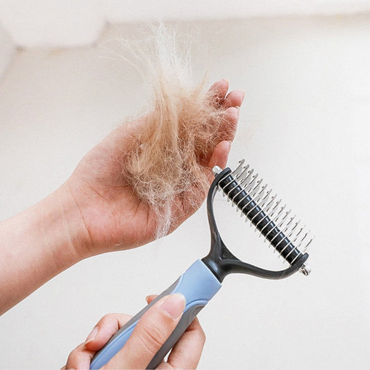 Pink small pet dematting comb with ergonomic handle – front view