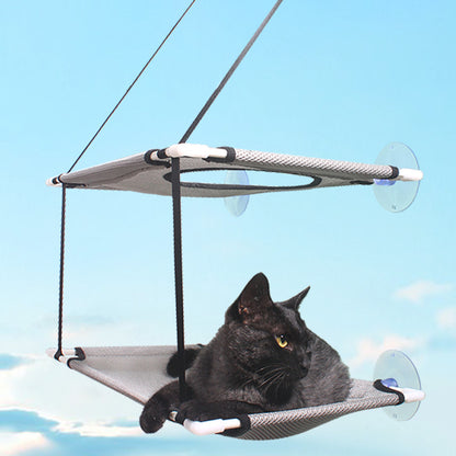 Suction cup window cat hammock mounted on glass – cat sunbathing perch