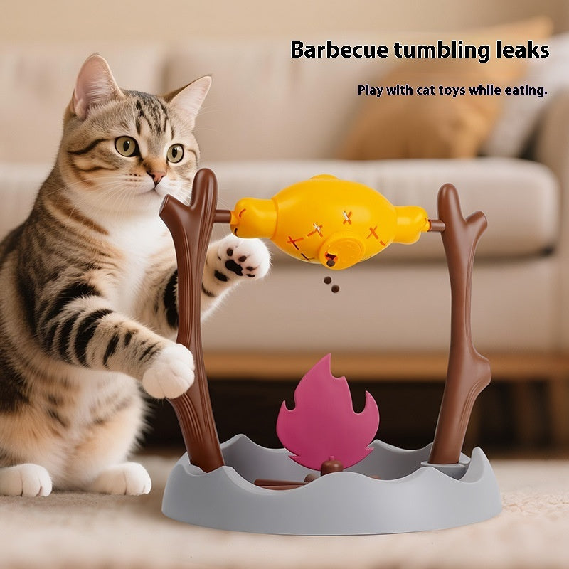 TumbleFeast treat dispensing feeder toy in use with cat pawing tumbler — slow feeding enrichment for indoor cats

