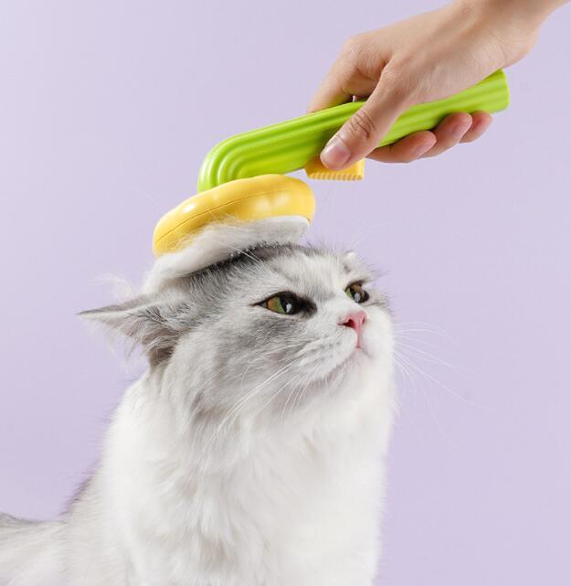 Yellow Sunflower PetGroom self-cleaning massage comb full product front view on white background
